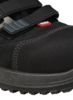 Preview: The image shows a black sports or cycling shoe with a sturdy upper. It has two black straps for closure and a grippy sole with a textured tread.