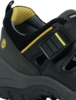 Preview: The image shows a black children's shoe with a breathable perforated pattern and a Velcro fastener. Yellow accents are visible on the top and the lining. The sole is sturdy.