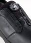 Preview: The image shows a black, modern shoe with a smooth surface. At the top, there is a flexible quick-lacing system with a convenient twist lock.