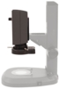 Preview: The image shows a microscope with a black upper part mounted on a stable, gray base. The base has a round, transparent area in the center.