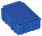 Preview: The image shows a small, rectangular container in bright blue. It has a rounded top and side grooves for better grip. The lid is slightly raised.