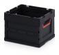 Preview: This is a black, rectangular plastic transport box. It has open sides and handles in bright red, which facilitate carrying.