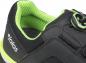 Preview: The image shows a black sports shoe with green accents. The interior is made of breathable mesh material, and the lacing system consists of a convenient snap closure.