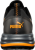 Preview: The image shows the back part of a black sports shoe with orange accents. On the heel, the "PUMA" logo is large and clear. The sole is thick and dark.