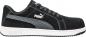 Preview: The shoe is black with a velvety upper. It has a white rubber sole, gray accents, and the Puma logo on the side. The laces are threaded through eyelets.