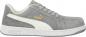 Preview: The shoe is a sporty, gray suede sneaker with a white sole. There is a white marking on the side and the Puma logo in gold. It has laces and a classic shape.