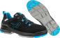 Preview: The image displays a sporty shoe in black with blue accents. The sole is thick and grippy, ideal for outdoor activities. Lacing is visible and provides good support.