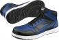 Preview: The image shows a pair of athletic shoes by Puma. They are black and blue with high lacing. The sole has a non-slip, textured pattern.