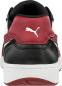 Preview: The image shows the back of a sneaker. The colors are black, red, and white. On the heel, there is the Puma logo in white on a red background. The sole is light and flat.