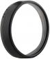 Preview: The image shows a narrow, round ring made of black material. The surface is smooth, with a slightly thicker-looking rear edge. The ring has a subtle shine on the inside.