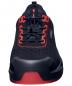 Preview: The shoe is sporty and black with red accents. It has a non-slip sole and a breathable upper. The lacing is central and functionally designed.