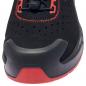 Preview: The image shows the front view of a black sports shoe with red accents. The shoe has a textured surface and a sturdy, grippy sole.