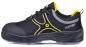 Preview: The image shows a black safety or work shoe with yellow accents. It features a comfortable, padded surface and a non-slip, sturdy sole. Laces are included.