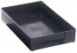 Preview: The image shows a rectangular, flat storage box in black, with rounded corners and a short handle area on one side. It has a smooth interior surface.