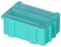 Preview: The image shows a small, rectangular box in a bright turquoise. It has a transparent lid and is made of sturdy plastic. The sides are slightly textured.