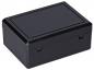 Preview: It is a rectangular, flat box made of black plastic. The top is smooth and flat, the edges are slightly rounded. The box has a hinged lid and a sturdy construction.