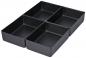 Preview: The image shows four rectangular, flat containers in matte black, closely packed together. They are uniformly shaped and have no handles or lids.