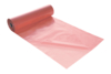 Preview: The image shows a roll of shiny, pink plastic material. Part of the material is laid flat on a surface, while the rest remains coiled on the roll.