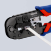 Preview: The image shows a cable cutter or crimping tool in black and blue. A thin, white cable is inserted while the tool is open, ready for crimping or cutting.