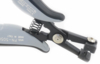 Preview: The image shows a pair of pliers with silver and black handles. The pliers feature a spring-loaded mechanism and a sharp, narrow opening. They appear sturdy and precise.