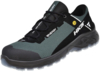 Preview: The shoe is a sporty, lightweight trail shoe. The colors are black and dark green with mesh-like inserts. The sole is sturdy and provides good grip on uneven terrain.