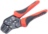 Preview: The image shows a large, black wire cutter with red rubber handles. The handles are ergonomically shaped, and the cutting area has various openings for stripping wires.