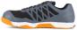 Preview: The shoe is sporty, featuring a gray and black color scheme with an orange sole area. The sole is flat and textured, ideal for high-movement activities.