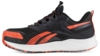 Preview: The shoe is sporty and black with orange accents. It has a flat, thick sole and offers good cushioning. The laces are black, and the surface has a modern look.