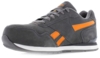 Preview: The image shows a gray sports shoe made of soft material. It features a modern design with orange accents on the side and a white sole. The shoelaces are gray.