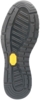 Preview: The image displays the underside of a shoe. The sole is made of black rubber with a non-slip tread featuring deep grooves and patterns. A yellow logo is visible.