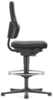 Preview: The chair has a high, padded seat and an ergonomic backrest. It is mounted on a stable frame and has a round footrest. The color is black.