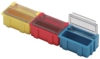 Preview: The image shows three small, rectangular plastic containers in different colors: yellow, red, and blue. Each container has a transparent lid and is arranged upright.