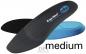 Preview: The image shows three shoe soles in different colors: a black one, a blue one, and a gray one. The gray sole has the word "medium" on it. They are ergonomically designed.