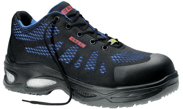 The image shows a black work shoe with blue and gray patterns. It has a thick, black sole and laces. The shoe provides protection and is designed for use at work.