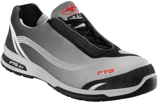 The shoe is sporty and snug, primarily in gray and black. It has an elastic lacing, a white wave line, as well as the red logo 