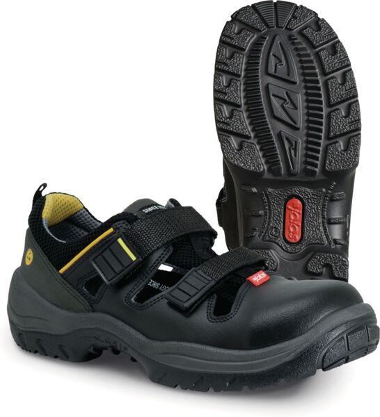 The image shows a black shoe with two wide Velcro straps and a non-slip sole. The inside is yellow, and the shoe has a sporty shape, ideal for outdoor activities.