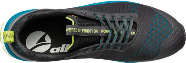 The shoe is black with blue and yellow accents. It has a sporty design, laces, and a grippy sole. Inside, a logo is visible. It appears lightweight and functional.