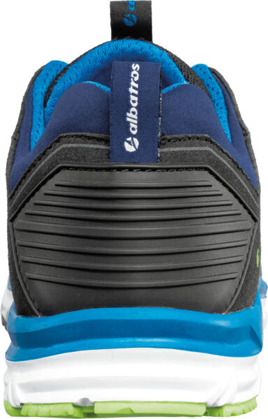 The image shows the rear view of a sports shoe. It is primarily black with blue and green accents. The sole is white and features a textured pattern. A logo is visible.