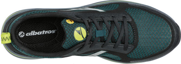 The shoe is dark green with a breathable mesh material. It has black laces, a yellow footbed marking, and a green sole that is well cushioned.