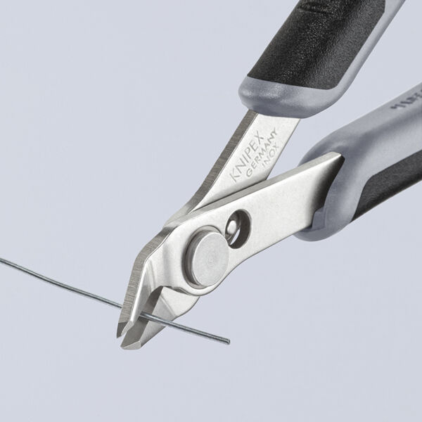 The image shows a pair of pliers with an ergonomic handle. The pliers have a sharp cutting edge, ready to cut through a thin wire. The background is bright and neutral.