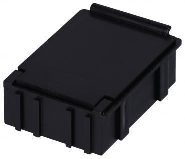 The image shows a black, rectangular box with a slightly curved top. It has rounded corners and vertical grooves on the sides, which give it a textured surface.