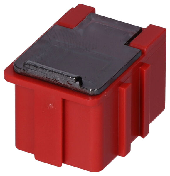 The image shows a small, square box in bright red with a black lid. On the side, two vertical grooves are visible. The box appears sturdy and compact.