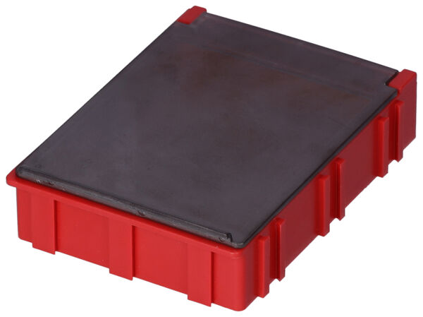 The image shows a rectangular, red box with a smooth, dark top. It has a sturdy, textured edge and is likely intended for storing items.