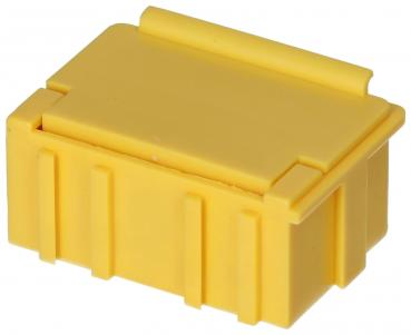 The image shows a small, rectangular box in bright yellow. It has a smooth surface, side grooves, and a slightly elevated lid, indicating that it can be closed.