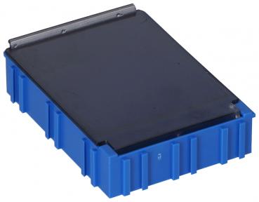 The image shows a blue container with a smooth, dark top. The container has vertical grooves on the sides and a flat shape resembling a small box.