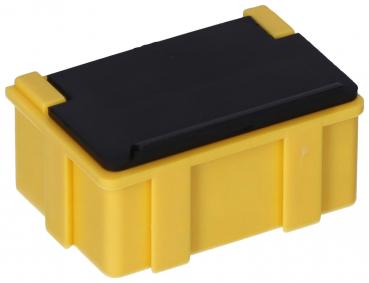 It is a rectangular box with a yellow bottom and a black lid. The corners are rounded, and the box has side grip indentations.