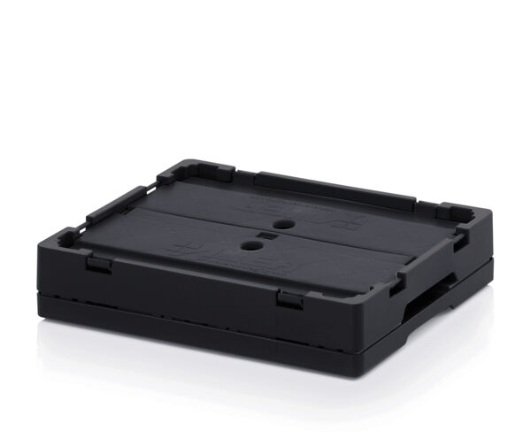 It is a black, rectangular plastic plate with rounded corners. The surface is smooth and there are two holes in the middle. It has a flat, compact shape.