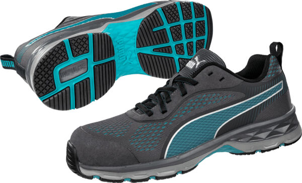 The image displays a pair of athletic shoes in black with turquoise accents. The sole is treaded for good grip, and the upper material features a light, breathable texture.