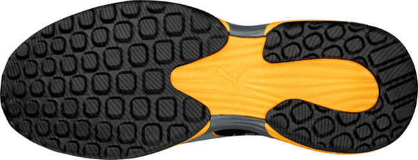 The image shows the sole of a sports shoe. It is predominantly black with an orange middle zone. The surface has a textured pattern of small, round protrusions.