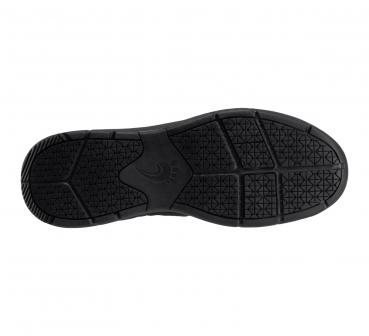 The image shows the black sole of a shoe. It features a textured pattern made from various rubber inserts, which ensure good grip and slip resistance.